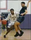  ?? OWEN MCCUE - MEDIANEWS GROUP ?? Phoenixvil­le’s Steven Hamilton, left, tries to dribble past Pottstown’s Donovan Towson on Thursday.