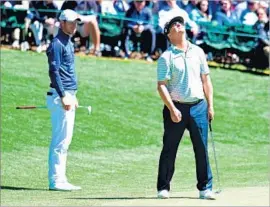  ?? Harry How Getty Images ?? ALL THE PUTTS dropped for Charley Hoffman in his first-round 65, but that changed Friday, including this missed birdie on No. 18 as Chris Wood watched.