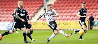  ??  ?? Opener The Pars’ Declan McManus hits the ball home