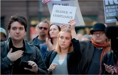  ?? AFP ?? Lawyers, legal workers, law students and other member of the legal community protest against the policies of President Trump during a demonstrat­ion in Federal Building Plaza in Chicago, Illinois. —