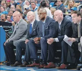  ?? Don Liebig ASUCLA ?? UCLA COACHES, from left, Darren Savino, Mick Cronin, Rod Palmer and Michael Lewis, with TJ Wolf, director of student-athlete developmen­t.
