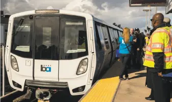  ?? Jessica Christian / The Chronicle ?? If approved by voters in June, Regional Measure 3 would raise an estimated $4.45 billion to be used for Bay Area transporta­tion projects, including buying more new BART train cars.