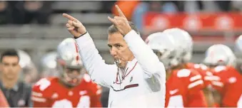  ?? GREG BARTRAM/ USA TODAY SPORTS ?? Ohio State coach Urban Meyer has Michigan and Wisconsin up next.