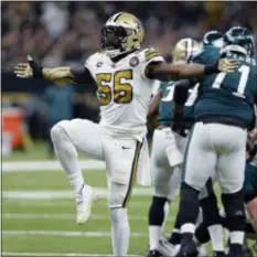  ?? BILL FEIG — THE ASSOCIATED PRESS FILE ?? New Orleans linebacker Demario Davis (56) celebrates a defensive stop against the Eagles in New Orleans.