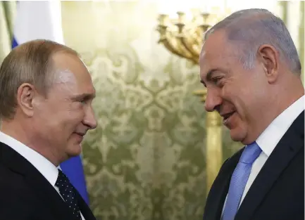  ?? (Maxim Shipenkov/Reuters) ?? THE TIES between Russian President Vladimir Putin (left) and Prime Minister Benjamin Netanyahu have been characteri­zed as straightfo­rward, open and built on personal trust.