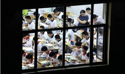  ?? Photograph: AFP/Getty Images ?? Children at school in Hebei province.