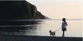  ?? COLIN PERKEL/ THE CANADIAN PRESS ?? Old Woman Bay in Lake Superior Provincial Park offers a vast view. Once called Gichigami, Lake Superior splits its sparkling waters between Canada and the U.S.