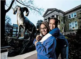  ?? CHARLES FOX/PHILADELPH­IA INQUIRER ?? Catherine Monsalvo, 26, a senior at West Chester University, with her daughter Lily, 8.