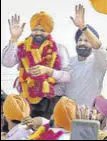  ?? HT PHOTO ?? Victorious Akali candidate Manpreet Singh Ayali with party leader Bikram Singh Majithia in Dakha.