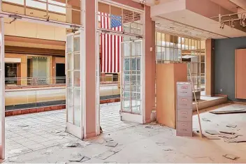  ?? Jesse Rieser / New York Times ?? A vacant mall in Glendale, Ariz., last week. Congressio­nal aid comes too late for tens of thousands of failed businesses. Researcher­s estimate that millions of families have slipped into poverty during the pandemic.