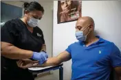  ?? PHOTO: LARRY VALENZUELA/CALMATTERS/CATCHLIGHT LOCAL ?? Fresno resident Gonzalo Garcia receives the mpox vaccine on Aug. 24, 2022.