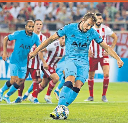  ??  ?? On target: Harry Kane scores Tottenham’s opening goal from the penalty spot in the 26th minute of last night’s group tie