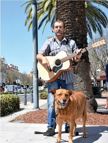  ?? Photo: ?? FOLLOWING PASSION: Neil Pepper and his faithful dog Ruby spent enjoy busking around the country.