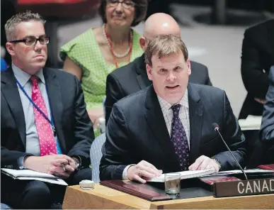  ?? JULIE JACOBSON/ THE ASSOCIATED PRESS ?? John Baird speaks to the UN Security Council on Sept. 19. Although Baird followed U.S. do-nothing policy on pro-democracy rebels in Syria, at least he opposed U.S. rapprochem­ent with Tehran’s terror regime, writes Terry Glavin.