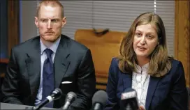  ?? CHARLIE NEIBERGALL / AP ?? Rita Bettis (right), the American Civil Liberties Union of Iowa legal director, speaks at a news conference as Emma Goldman Clinic attorney Sam Jones looks on. A judge says he’ll temporaril­y block the state’s new abortion restrictio­ns.