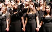  ?? JESI YOST - FOR MEDIANEWS GROUP ?? Pine Forge Academy Choir and the Boyertown Area High School Show Choir join hands and sing, “We Shall Overcome” during the 21st annual Martin Luther King Jr. service at New Hanover United Methodist Church.