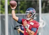  ?? Brett Coomer/Staff photograph­er ?? Texans quarterbac­k C.J. Stroud will likely split first-team reps with incumbent starter Davis Mills. But the starting job is likely the No. 2 overall pick’s to lose.