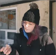  ?? Canadian Press photo ?? Shelby Curtis smokes cannabis at her home in Regina.