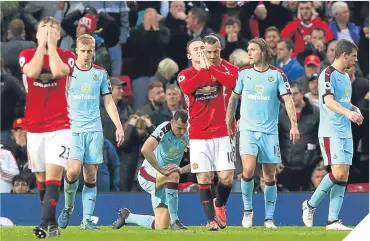  ??  ?? Wayne Rooney (centre) can’t hide his frustratio­n as United fail to break the deadlock.