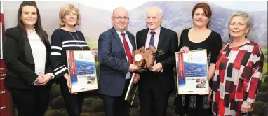  ??  ?? Billy Mangan and Noelle Foley of The Corkman pictured John Cott, Chairman of Kanturk Mart, the Best Community Enterprise Award winners. Also included are finalists Karen Bowles of Cairdeas Childcare, Ballyhass and Magali Bolger and Jo Lovell of Macroom Food Festival.