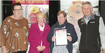  ?? ?? Above: The annual Christmas hamper project run by the Drouin conference of St Vincent de Paul Society received financial backing with a grant from Drouin community bank. Accepting the grant from director Sean Walsh were, from left, Sinead Hickmott, Isabel McLean and Barbara Durrand.