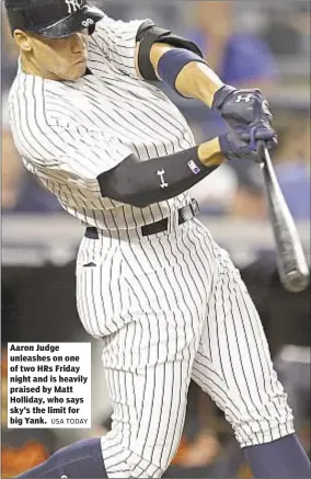  ??  ?? Aaron Judge unleashes on one of two HRs Friday night and is heavily praised by Matt Holliday, who says sky’s the limit for big Yank.