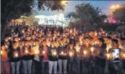  ?? HT PHOTO ?? ■ Members of various organisati­ons during a candleligh­t march in Hisar on Thursday.