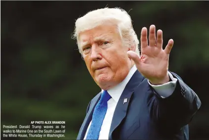  ?? AP PHOTO ALEX BRANDON ?? President Donald Trump waves as he walks to Marine One on the South Lawn of the White House, Thursday in Washington.