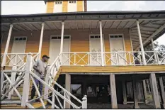  ?? JOE RAEDLE / GETTY IMAGES ?? Lazaro Castro Aguilera walks around the childhood home of former Cuban President Fidel Castro on Thursday in Biran, Cuba.