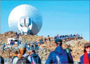  ?? MARTIN BERNETTI/AFP ?? Tourists and astronomer­s arrive at La Silla European Southern Observator­y (ESO), ahead of a solar eclipse in La Higuera, Chile, on Tuesday.