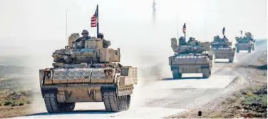  ?? Agence France-presse ?? ↑
A US IFV convoy patrols the area of Tal Alo, Syria, on Wednesday.