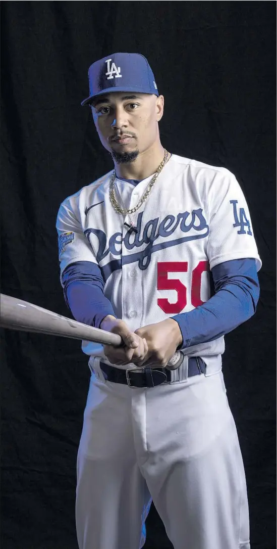  ?? KENT NISHIMURA Los Angeles Times ?? MOOKIE BETTS, who might be a Dodger for only the 60 games of this pandemic-shortened season, wants to make baseball cool for young Black people so more will play the sport. He thinks Major League Baseball needs to do a better job of promoting its stars and is also tackling racial injustice beyond baseball on his own.