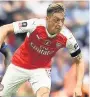  ??  ?? STAYING PUT Arsenal say they won’t let Ozil move on