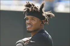  ?? ASSOCIATED PRESS ?? IN THIS SEPT. 8, 2019, FILE PHOTO, Carolina Panthers quarterbac­k Cam Newton (1) stretches prior to a game against the Los Angeles Rams in Charlotte, N.C.