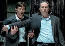  ?? ?? Michiel Huisman and Timothy Hutton in The Haunting of Hill House.