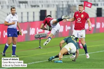  ??  ?? Cause of debate
Conor Murray is taken in the air by Cheslin Kolbe