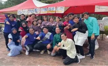  ?? — Bernama photo ?? Yuzairi (back, third left) aims to foster closer ties between Malaysia and Japan by offering Malaysians the opportunit­y to explore not just Tokyo and Osaka, but also the cultural richness of the rural areas like Hioki.