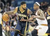  ?? Leah Klafczynsk­i Akron Beacon Journal ?? PACERS FORWARD Paul George, left, has reportedly told friends he wants to join Lakers in 2018.