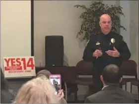  ?? KEVIN MARTIN — THE MORNING JOURNAL ?? Avon Lake Police Chief Duane P. Streator speaks to supporters of Issue 14 on Nov. 3 at the former Golden Acres Retirement Home at 45999 North Ridge Road in Amherst Township. The 0.3-mill tax levy on the ballot Nov. 6 would raise $2.01 million annually to convert the building into a substance abuse treatment center.