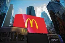  ?? MICHAEL NAGLE / BLOOMBERG ?? McDonald’s, the world’s largest restaurant company, has been tweaking its value offerings to stay relevant in price wars and is expanding delivery with Uber Eats to spur sales.