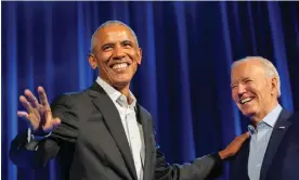  ?? Photograph: Alex Brandon/AP ?? Barack Obama greets Joe Biden at a fundraisin­g event at Radio City Music Hall in New York last month.