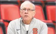  ?? Carlos Osorio / Associated Press ?? In this March 15, 2018, file photo, Syracuse head coach Jim Boeheim watches during a practice for an NCAA tournament first-round game, in Detroit.