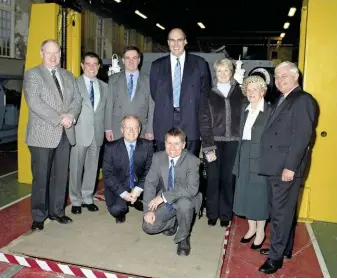  ?? A1SLT ?? BELOW Some of the leading lights and personalit­ies involved in the ‘A1’ project gather in Darlington with the part-built locomotive in 2000. Left to right (standing): Commercial director Andrew Dow, project co-founder Barry Wilson, David Elliott, chairman Mark Allatt, Gill Champion, president (and widow of Arthur Peppercorn) Dorothy Mather and former chairman David Champion, (kneeling) electronic­s engineer Rob Morland and works manager Bill Brown.