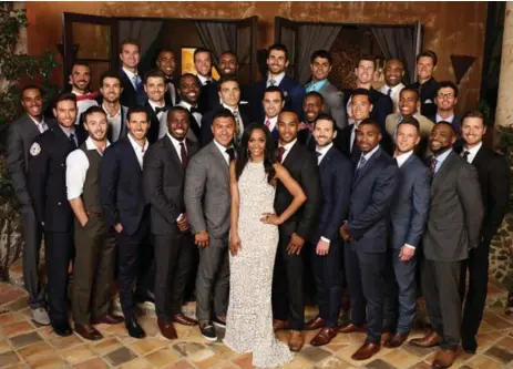  ?? CRAIG SJODIN/WARNER BROS. ENTERTAINM­ENT ?? Rachel Lindsay and the 31 men competing for her affections on the new season of The Bacheloret­te, which premieres Monday night.