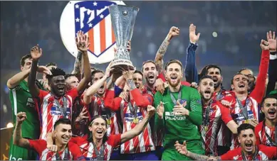  ??  ?? De dolblije spelers van Atlético Madrid, na het behalen van het Europa Leaguekamp­ioenschap. (Foto: ESPN)