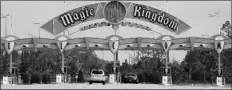  ?? ASSOCIATED PRESS ?? PARK GUESTS ENTER THE MAGIC KINGDOM during the reopening of Walt Disney World, in Lake Buena Vista, Fla., on Saturday.