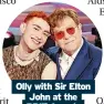  ?? ?? Olly with Sir Elton John at the BRIT Awards