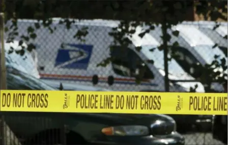  ?? MATT ROURKE — THE ASSOCIATED PRESS ?? Police tape cordons off a post office in Wilmington, Del., Thursday. A law enforcemen­t official said suspicious packages addressed to former Vice President Joe Biden were intercepte­d at Delaware mail facilities in New Castle and Wilmington and were similar to crude pipe bombs sent to former President Barack Obama, Hillary Clinton and CNN.