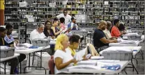  ?? BRUCE R. BENNETT / THE PALM BEACH POST ?? The Supervisor of Elections Service Center in Riviera Beach is abuzz with activity Tuesday, primary election day, which went smoothly for the most part at polling places.