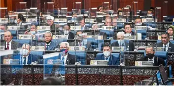  ?? — Bernama ?? Time to vote: Members of Parliament voting for the Supply Bill for the Prime Minister’s Department and the Finance Ministry. Despite the Opposition’s attempt to block the Bill, it passed the committee stage.